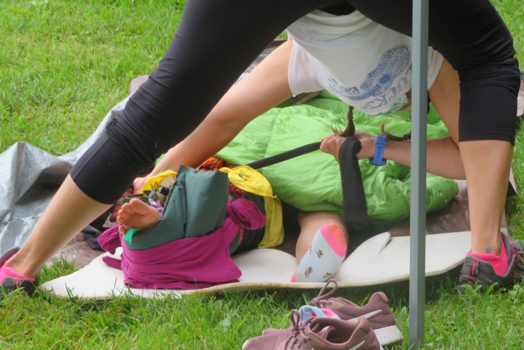 Woman Secures a Backcountry Leg Splint